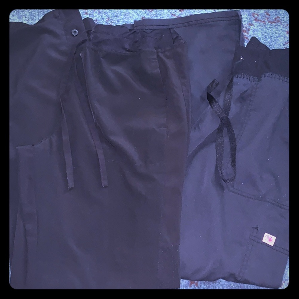 Two black scrub pants 👩🏼‍⚕️